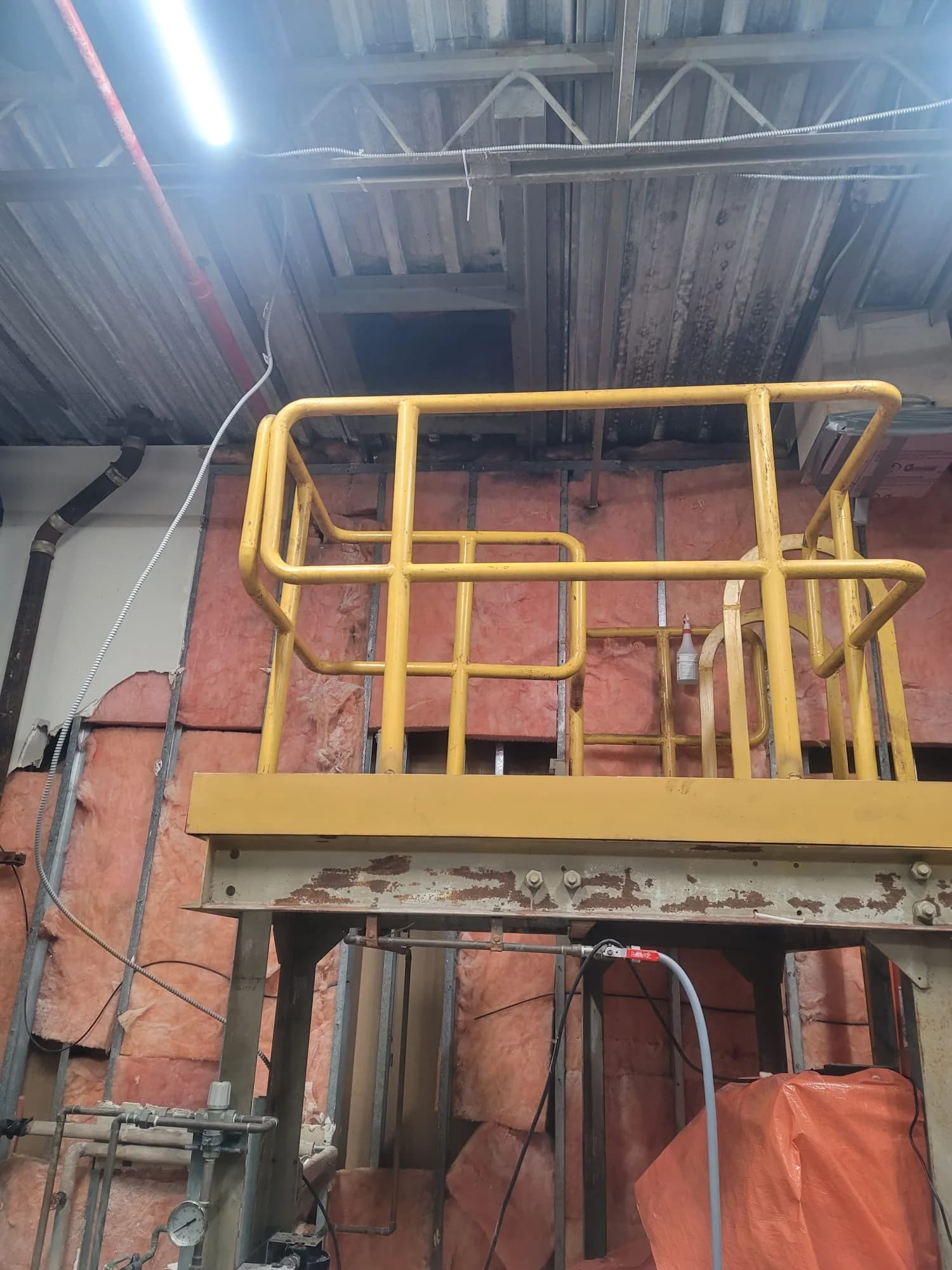 Access equipment positioned for laboratory exhaust ductwork isolation